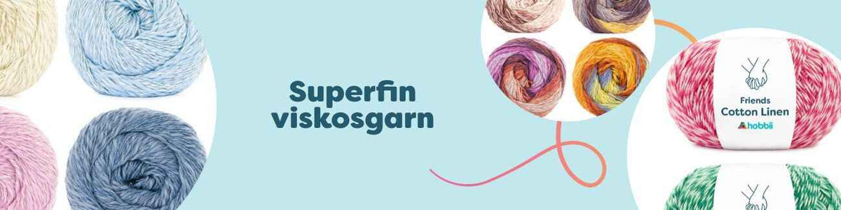 Närbild på nystan av superfin viskosgarn i enfärgade och melerade toner, mjukt och glansigt för stickning och virkning.