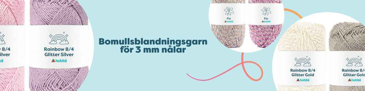 Närbild av mjuka bomullsblandningsgarnnystan för 3 mm nålar i flera färger från Hobbii, vackert ordnade på ett träbord.