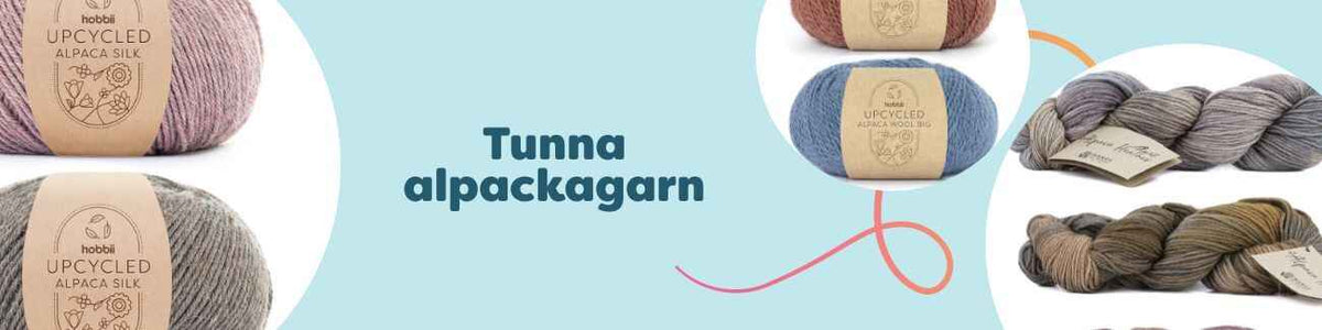 Nystan av tunna alpackagarn i olika färger på ett bord, idealiska för finstickning, sjalar och mellansvåra virkmönster.