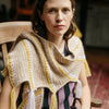 

Calendula Shawl - Sjal med puffmaskor och tofsar
2