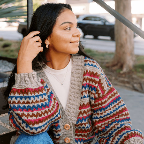 

Ottolie - Cardigan med chevronmönster och fickor
4