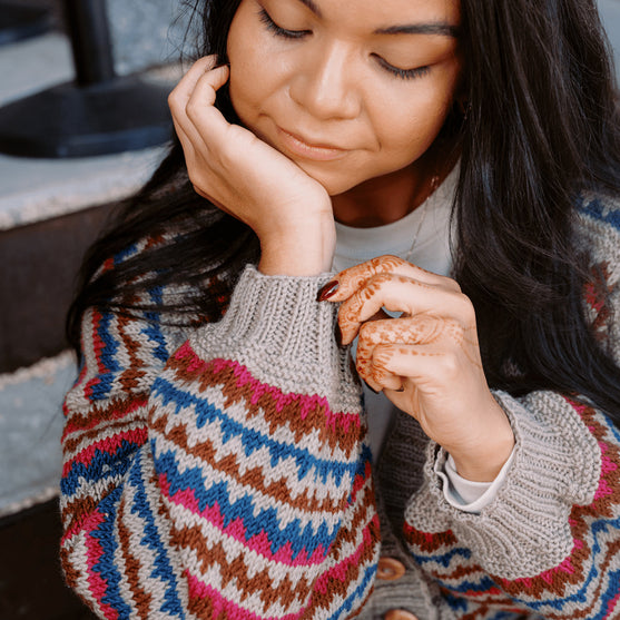 

Ottolie - Cardigan med chevronmönster och fickor
5