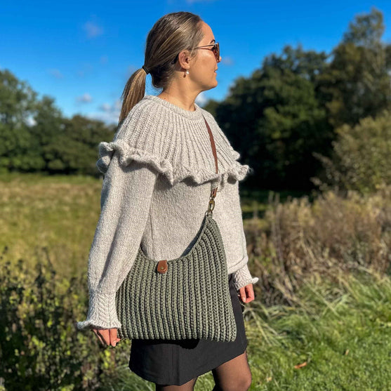 

Amelia - Axelremsväska
4