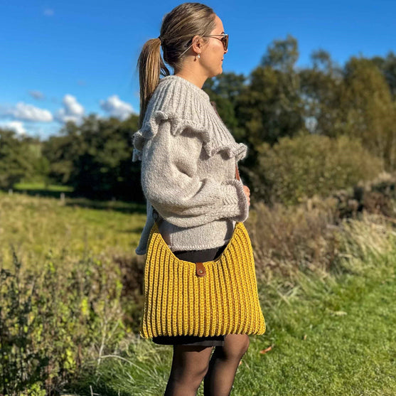 

Amelia - Axelremsväska
2