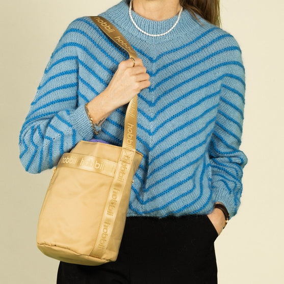 

Cylinder axelremsväska - Hobbii
9