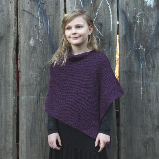 

Malene Barn Poncho
1